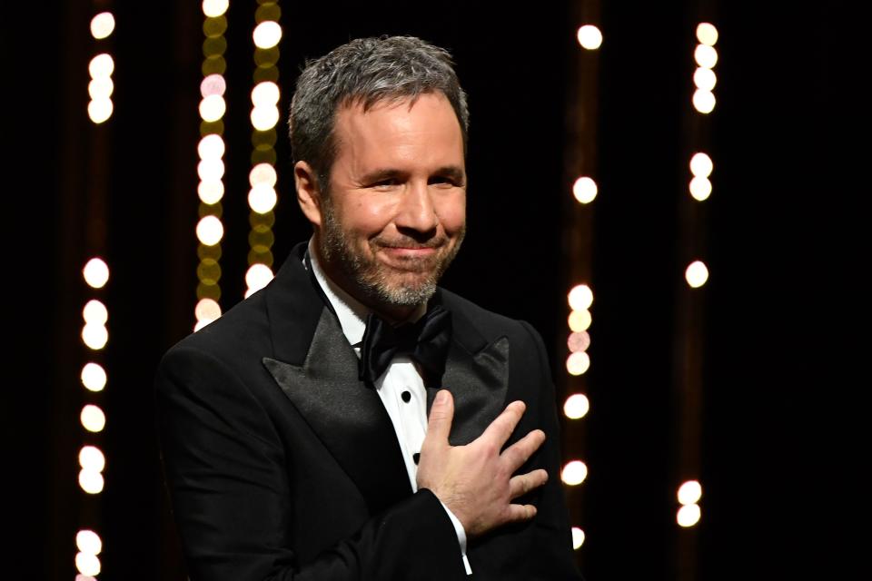 Canadian director and member of the Feature Film Jury Denis Villeneuve gestures as he arrives on stage on May 8, 2018 during the opening ceremony of the 71st edition of the Cannes Film Festival in Cannes, southern France. (Photo by Alberto PIZZOLI / AFP)        (Photo credit should read ALBERTO PIZZOLI/AFP via Getty Images)