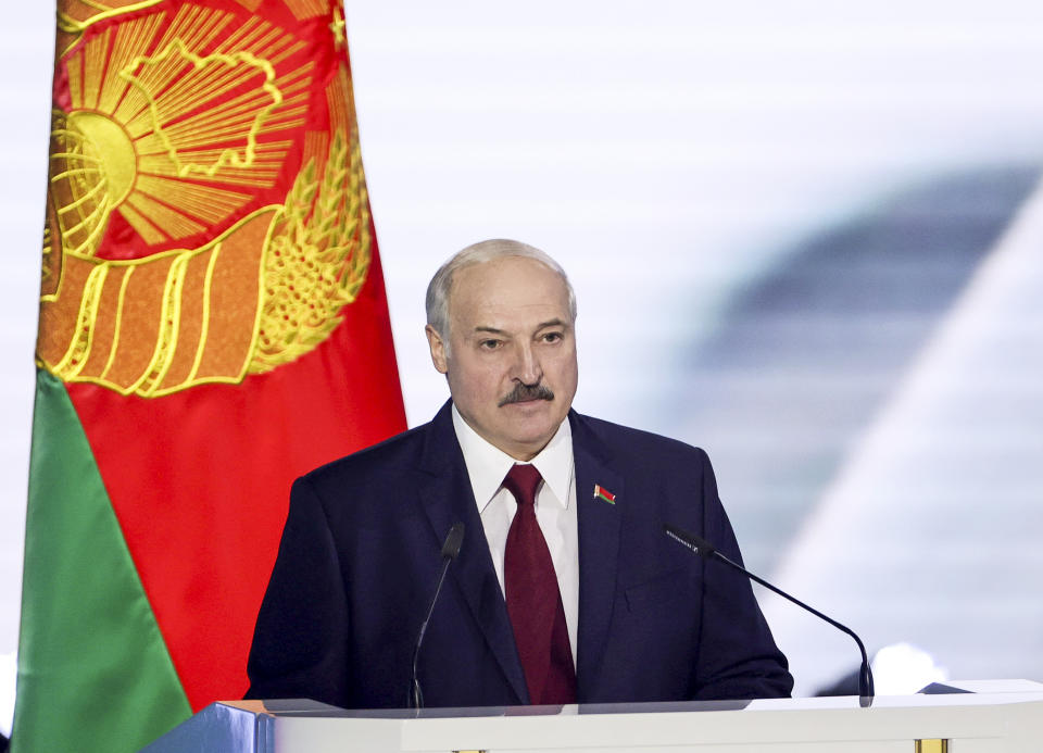 Belarus President Alexander Lukashenko delivers his speech during a state-of-the-nation address ahead of Sunday's election in Minsk, Belarus, Tuesday, Aug. 4, 2020. Belarus's authoritarian leader is vowing to maintain a close alliance with Russia despite the latest tensions as he seeks a sixth term in office amid a surge of opposition protests. President Alexander Lukashenko's comments in a state-of-the-nation address ahead of Sunday's election contrast with his diatribes against Russia last week. (Maxim Guchek/BelTA Pool Photo via AP)