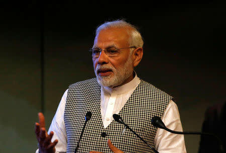 Prime Minister Narendra Modi speaks during the inauguration of a hydroelectric power plant in the state of Jammu and Kashmir, at Sher-i-Kashmir International Conference Centre (SKICC) in Srinagar, May 19, 2018. REUTERS/Danish Ismail