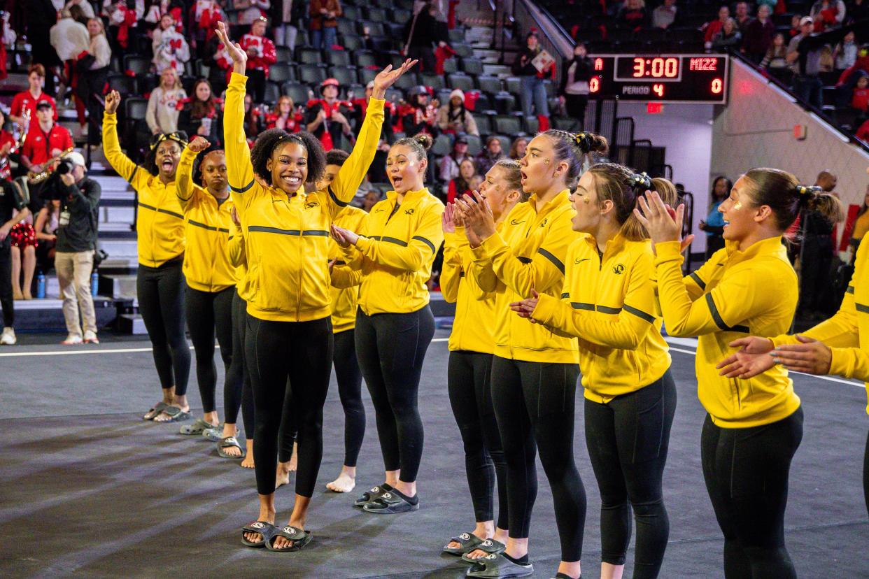 Missouri gymnast Jocelyn Moore waves as she is introduced ahead of a meet against Georgia on Jan. 20 in Athens, Georgia.