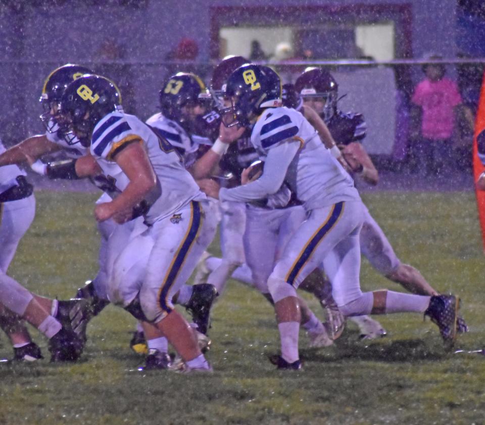 Hunter DeBarr follows his blockers during a 45-7 win over Union City Friday. DeBarr ran for 128 yards as Whiteford moved to 8-0.