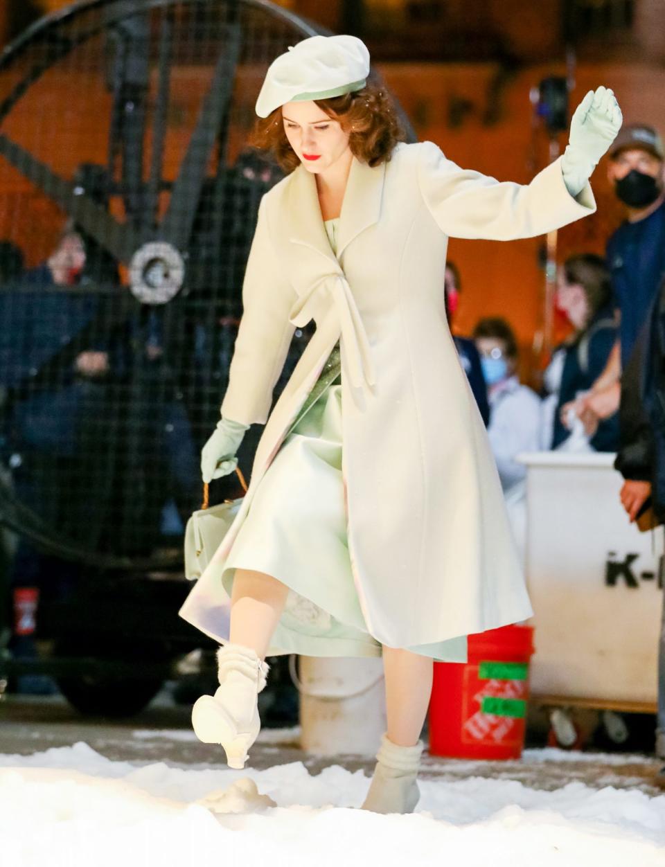 <p>Rachel Brosnahan is dressed for winter while filming an episode of <i>The Marvelous Mrs. Maisel </i>on June 24 in N.Y.C. </p>