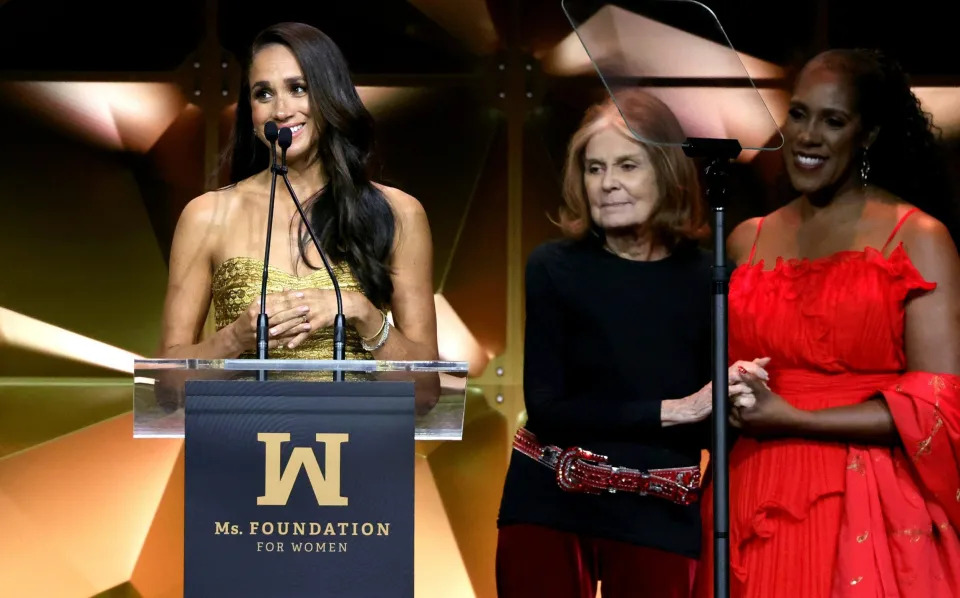 Duchess of Sussex speaks onstage with Gloria Steinem and Teresa Younger - Getty Images