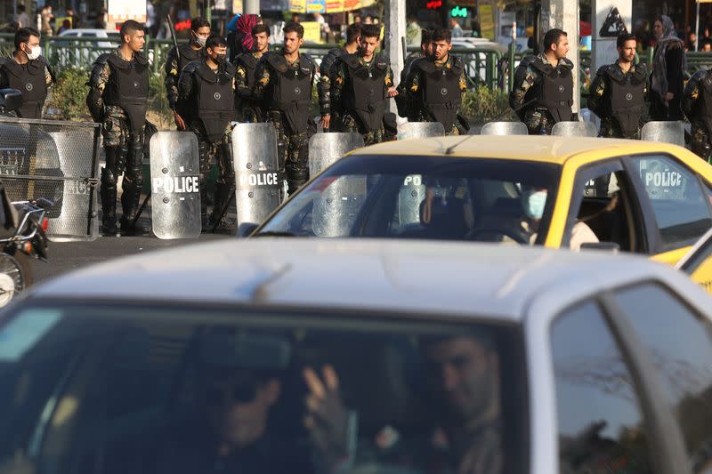 FILE PHOTO: Iran's riot police forces stand in a street in Tehran, Iran