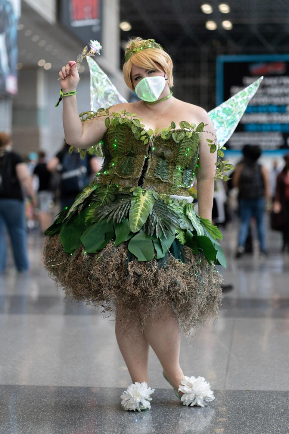 A cosplayer dressed as Tinker Bell at New York Comic Con 2021.