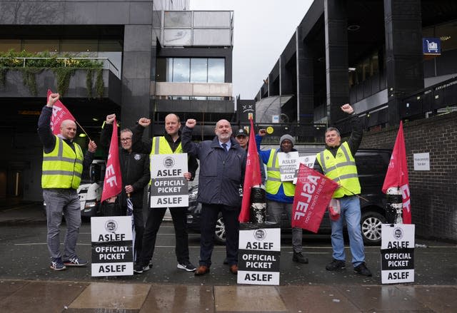 Aslef general secretary Mick Whelan (centre) on the picket line at Euston train station in London 