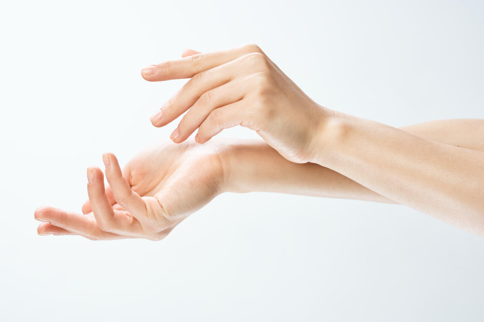 Female hands on a white isolated background