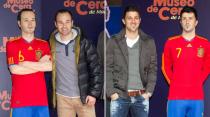 <p>Spain stars Iniesta and Villa pose awkwardly with their prosthetic pals. </p>