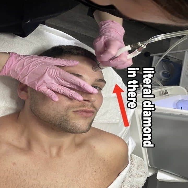 The author getting a facial