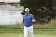 Gary Woodland waves after his putt on the fifth hole during the third round of the U.S. Open golf tournament Saturday, June 15, 2019, in Pebble Beach, Calif. (AP Photo/Matt York)