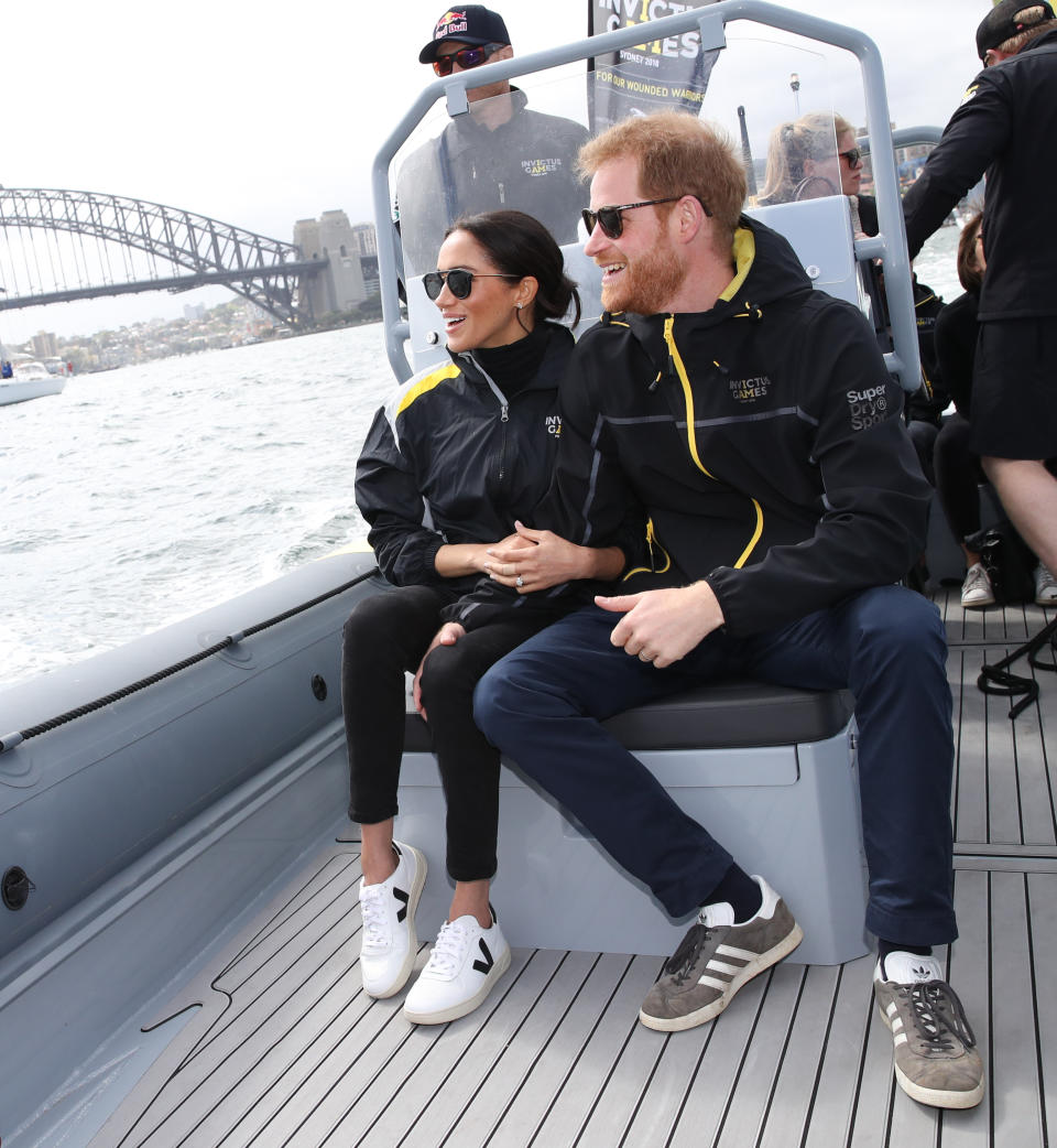 <p>Wearing this year’s £114 ‘It’ trainers (by sustainable label Veja) and an athletic get-up by SuperdrySport, Meghan showcased her sporty side for the first time. <em>[Photo: Getty]</em> </p>