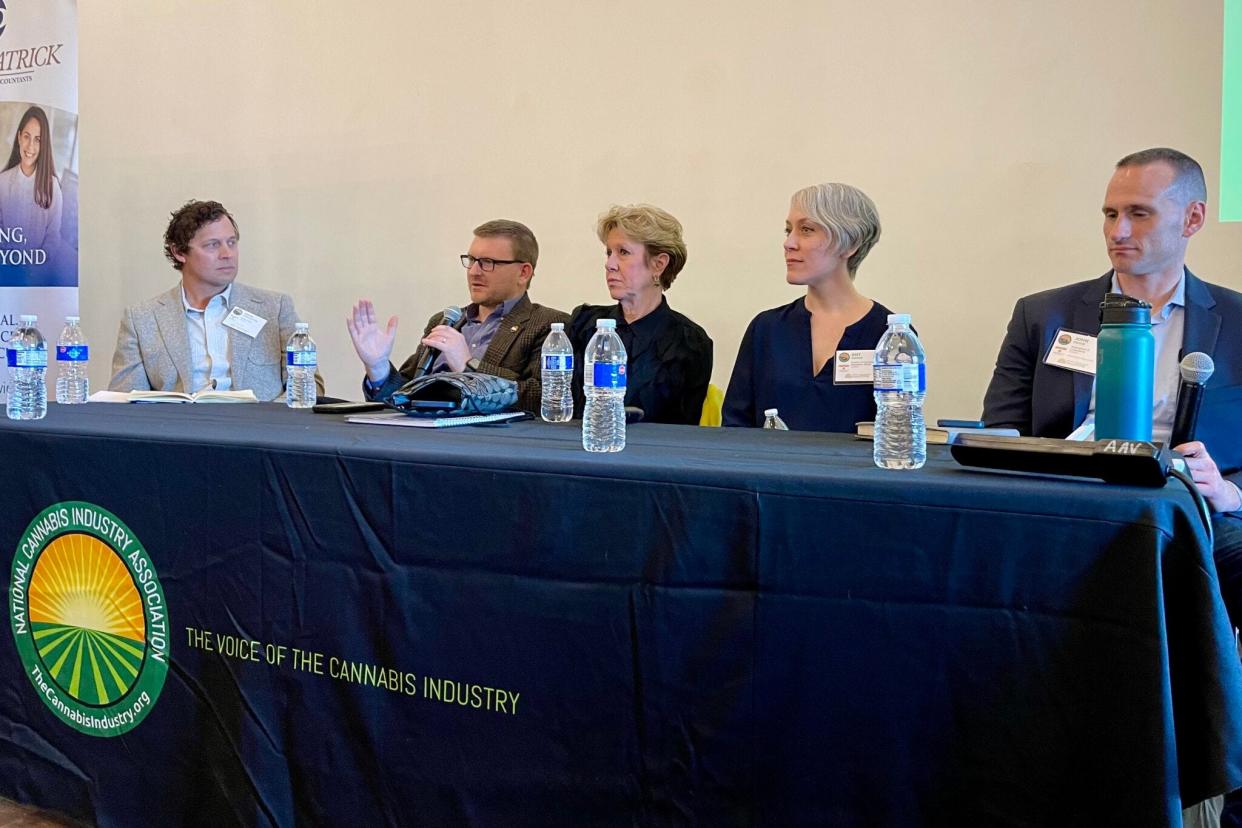 John Pennington, CEO of Proper Brands; Jamey Murphy, chief of staff for Sen. Nick Schroer; Mitch Meyers, partner at BeLeaf Medical; Amy Moore, director of the Division of Cannabis Regulation; and John Payne, managing partner at Amendment 2 Consultants, discuss legislation at an industry summit in downtown St. Louis on March 28.