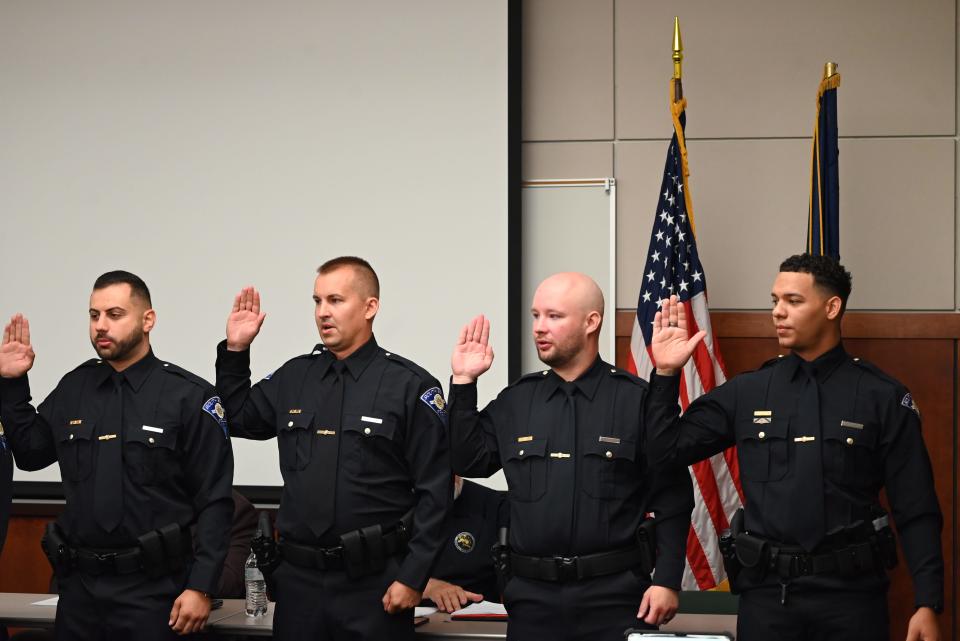 Thomas Petrizzo, Daniel Kurz, Nicholas Hess, Brandon Clark are sworn into the South Bend Police Department on May 15, 2024.