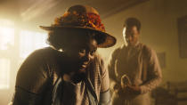 This image released by Warner Bros. Pictures shows Danielle Brooks, left, and Corey Hawkins in a scene from "The Color Purple." (Warner Bros. Pictures via AP)