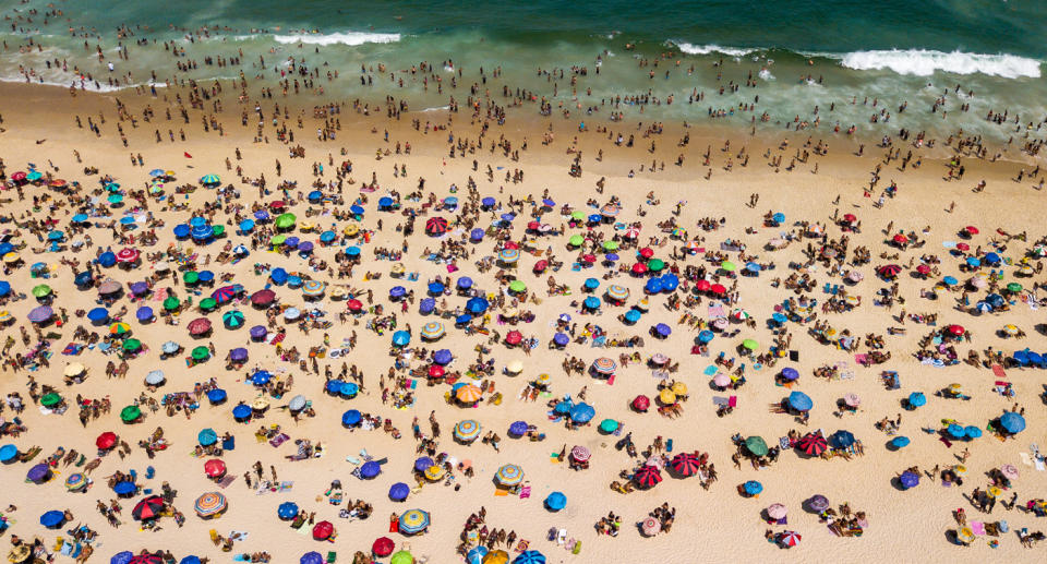 An aerial view of people at Ipanema Beach in Rio de Janeiro, Brazil, on the weekend. Source: Getty Images
