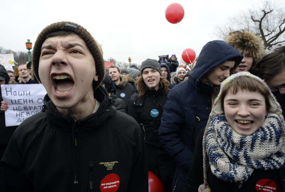 Opposition supporters yell during a&nbsp;rally in central Saint Petersburg.