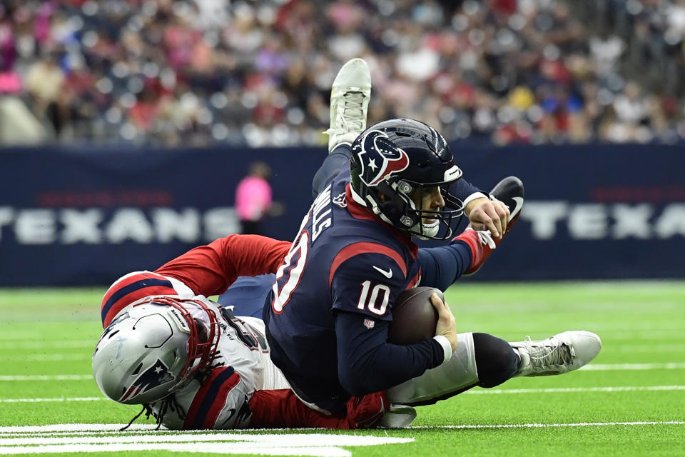 Houston Texans quarterback Davis Mills (10) is sacked by New England Patriots linebacker Matt Judon during the first half of an NFL football game Sunday, Oct. 10, 2021, in Houston. (AP Photo/Justin Rex)