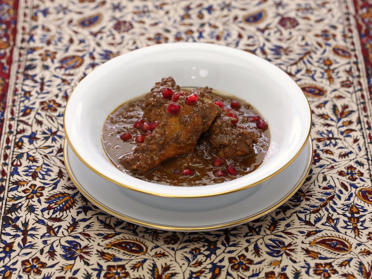 Khoresh morgh naardooni (pomegranate chicken stew), also called anar mosama, is a celebratory dish served on Yalda (Getty/iStock)