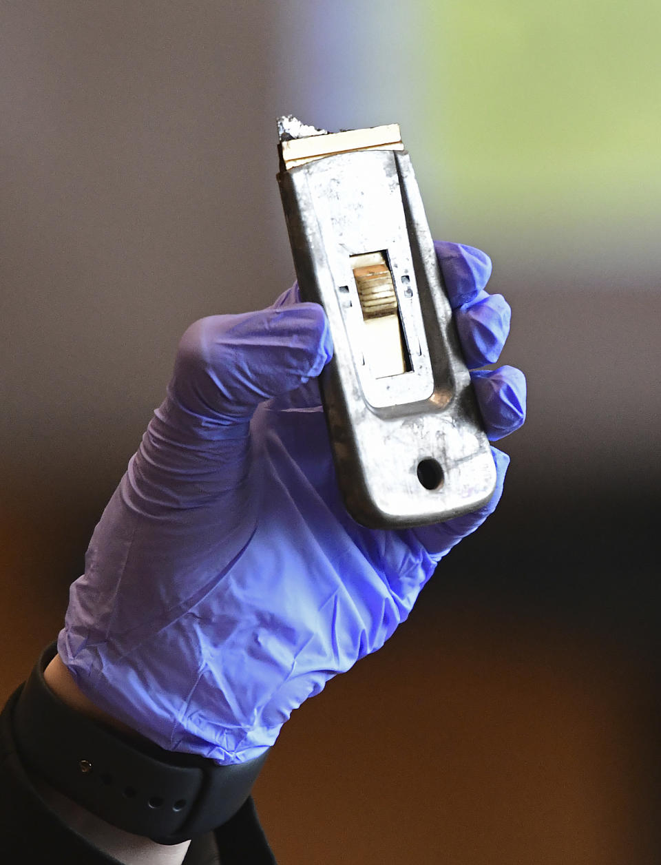 A box cutter with a broken razorblade edge containing a blood-like stain seized from a trash can on Albany Avenue in Hartford is presented as evidence on day eight of Michelle Troconis' criminal trial at Connecticut Superior Court in Stamford, Conn. Tuesday, Jan. 23, 2024. Troconis is on trial for charges related to the disappearance and death of New Canaan resident Jennifer Dulos. (Tyler Sizemore/Hearst Connecticut Media via AP, Pool)