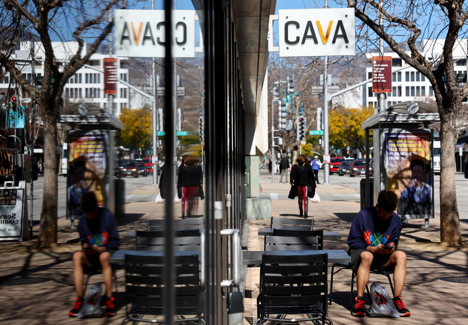 PASADENA, CALIFORNIA - FEBRUARY 06: A person sits outside a Cava restaurant chain location on February 6, 2023 in Pasadena, California. The Mediterranean restaurant chain announced that it has confidentially filed paperwork for an initial public offering (IPO) with the Securities and Exchange Commission. (Photo by Mario Tama/Getty Images)