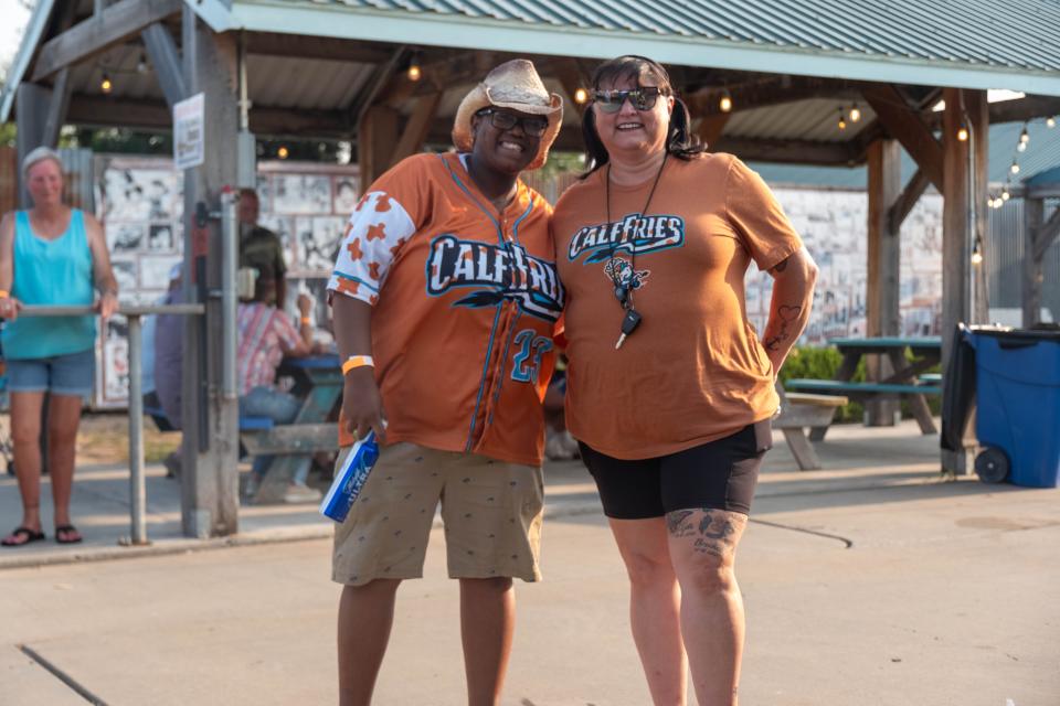 Lontisha Taylor-Long and Jerri Taylor show their love for calf fries Saturday evening at the 1st annual Calf Fry Festival at the Starlight Ranch Event Center in Amarillo.