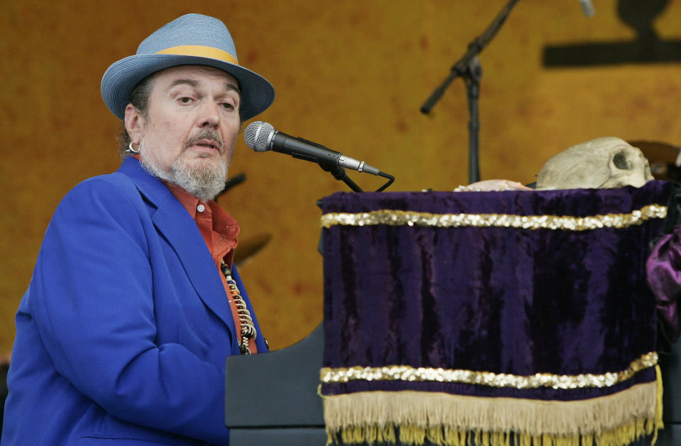 Dr. John performs during the New Orleans Jazz and Heritage Festival on April 28, 2006. The New Orleans singer and piano player died on June 6 at age 77. (AP Photo/Jeff Christensen)