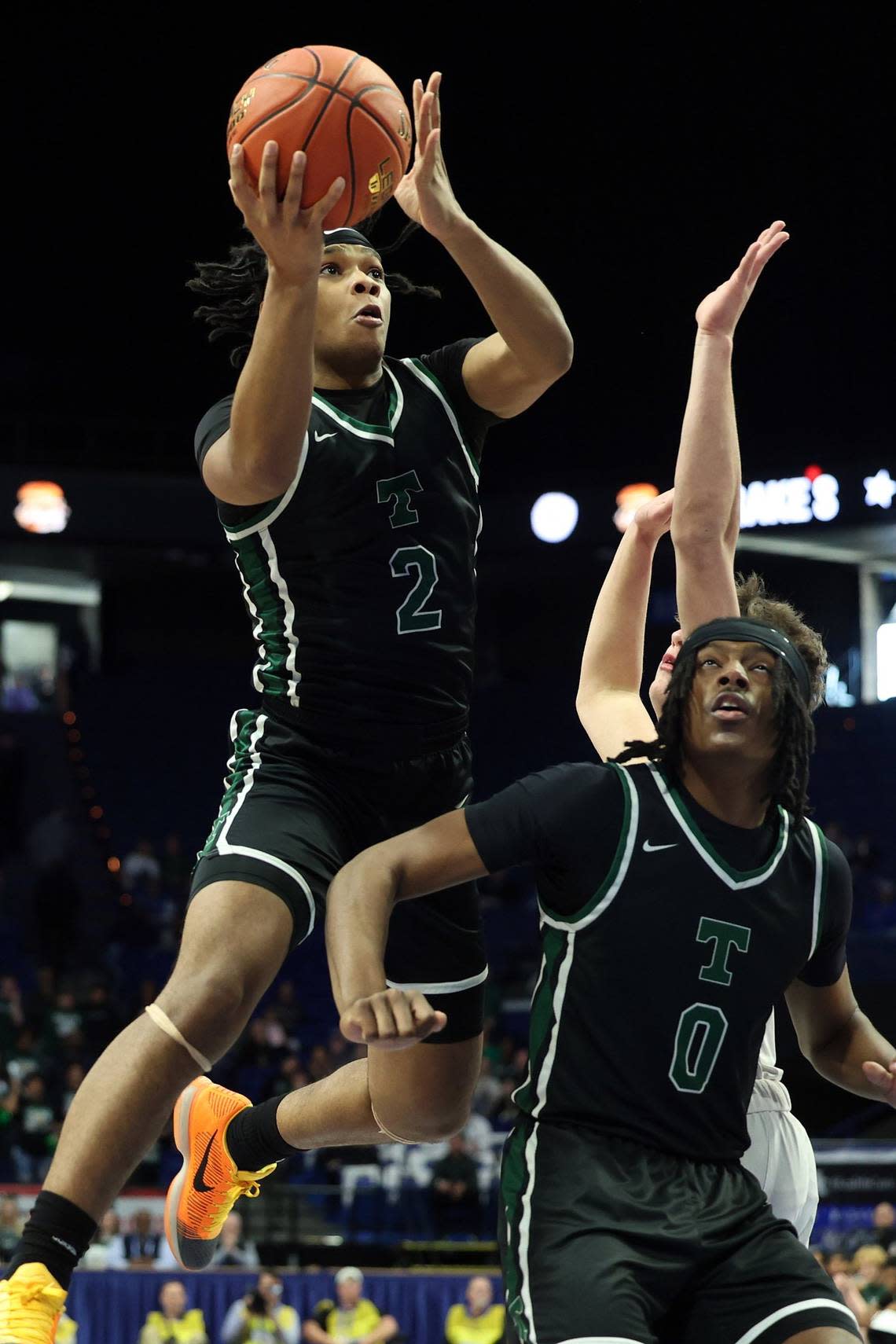 Trinity’s Andrae Vasser (2) made seven of his 10 shots from the field Thursday night. James Crisp