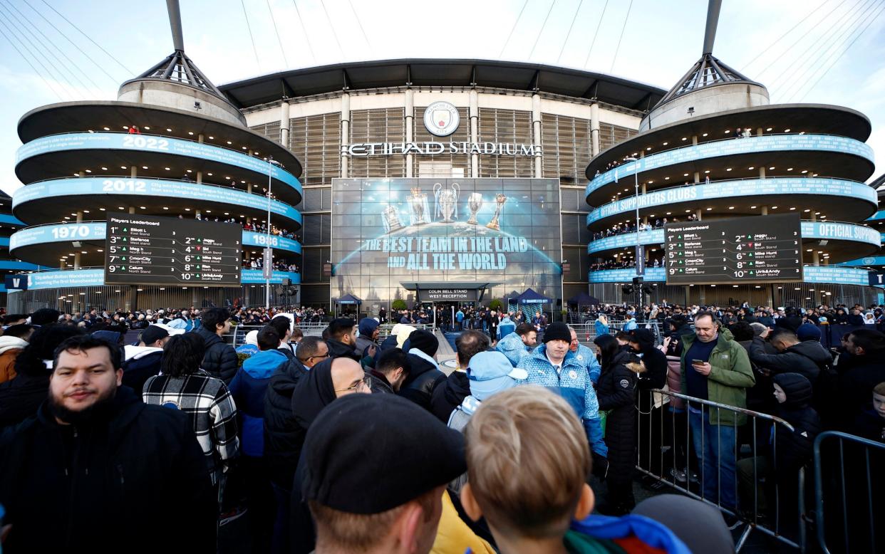 Fans outside the stadium before the match