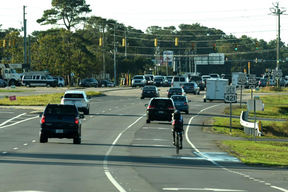 Traffic travels along Carolina Beach Road and College Road in the Monkey Junction area of New Hanover County.