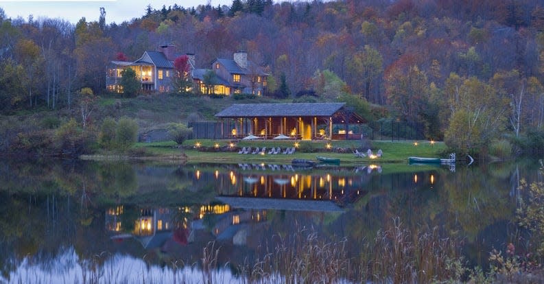 Cottages and rooms at Twin Farms overlook 300 acres of farmland and forest, including a pond.