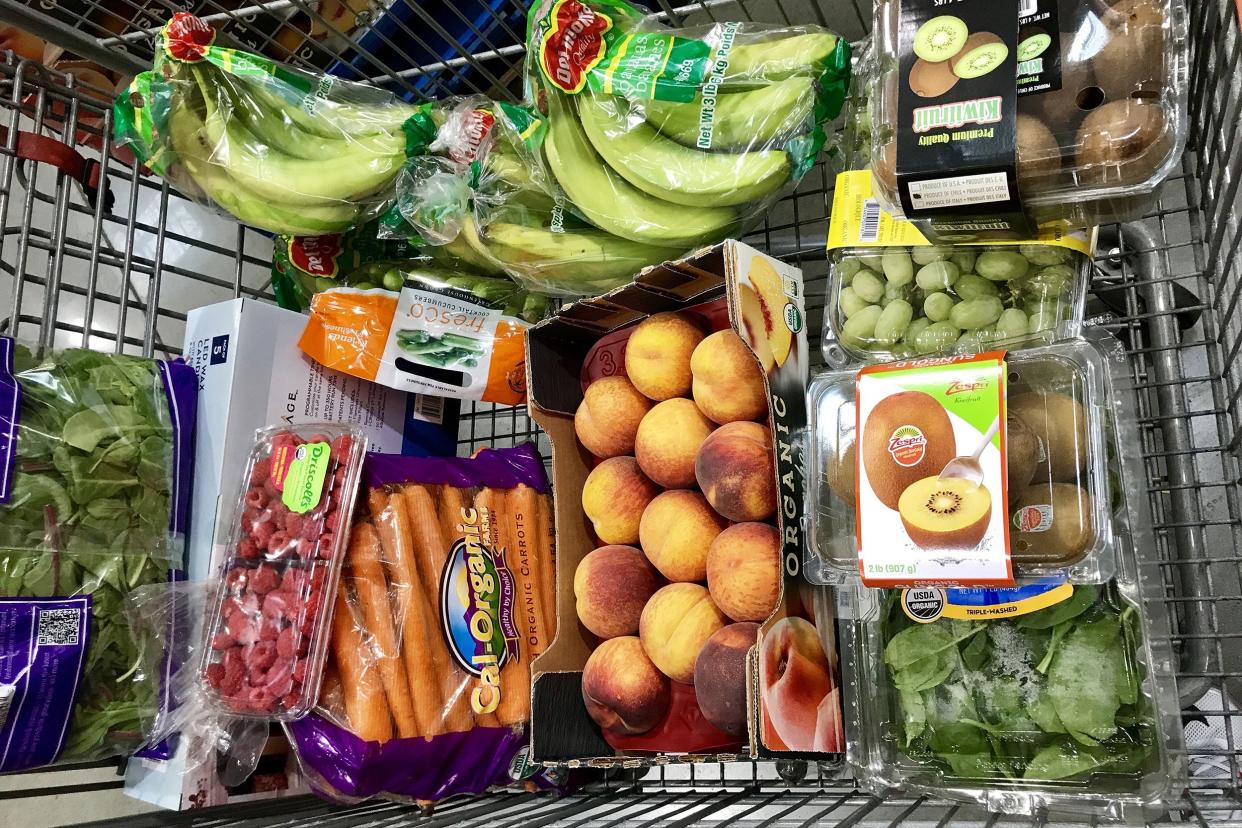 Costco Wholesale Warehouse Fruits and vegetables in cart.