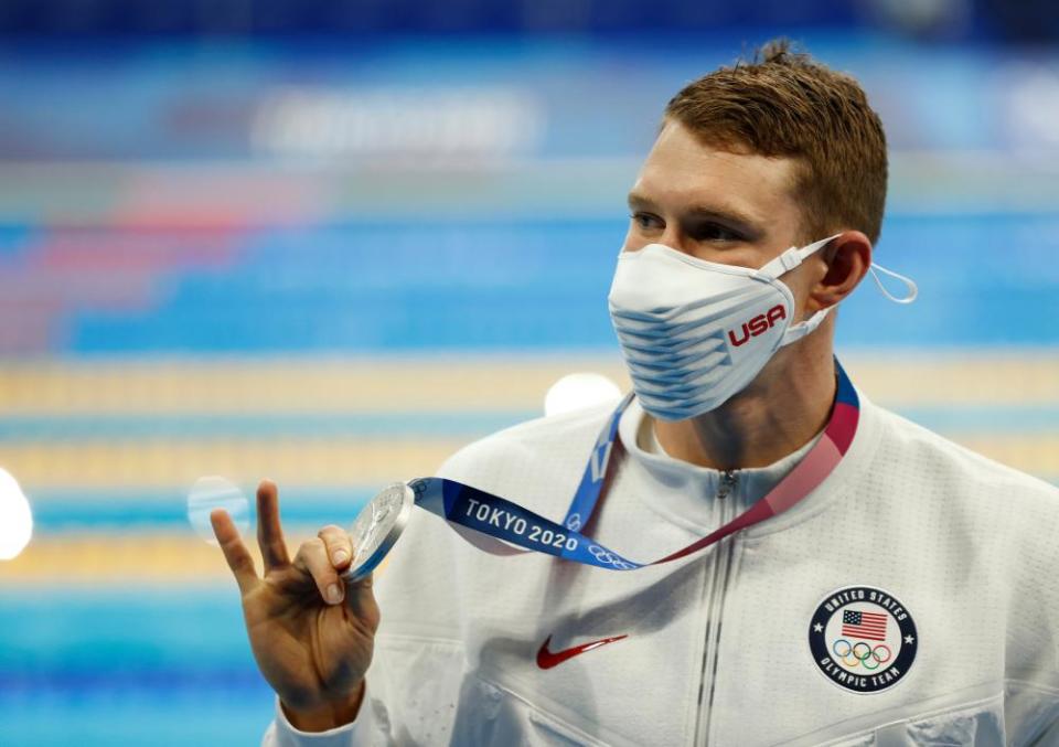 Ryan Murphy of the USA shows his silver medal from the men’s 200m backstroke final.