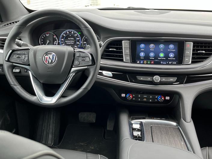 The 2022 Buick Enclave Avenir&#39;s interior features soft, padded materials, and 8-inch touch screen.