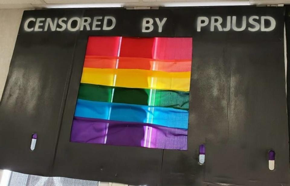A sign hangs up at Paso Robles High School in protest of the North County school district’s new flag policy, which followed an incident in which a LGBTQ Pride flag was stolen from a classroom and defecated on in a toilet.