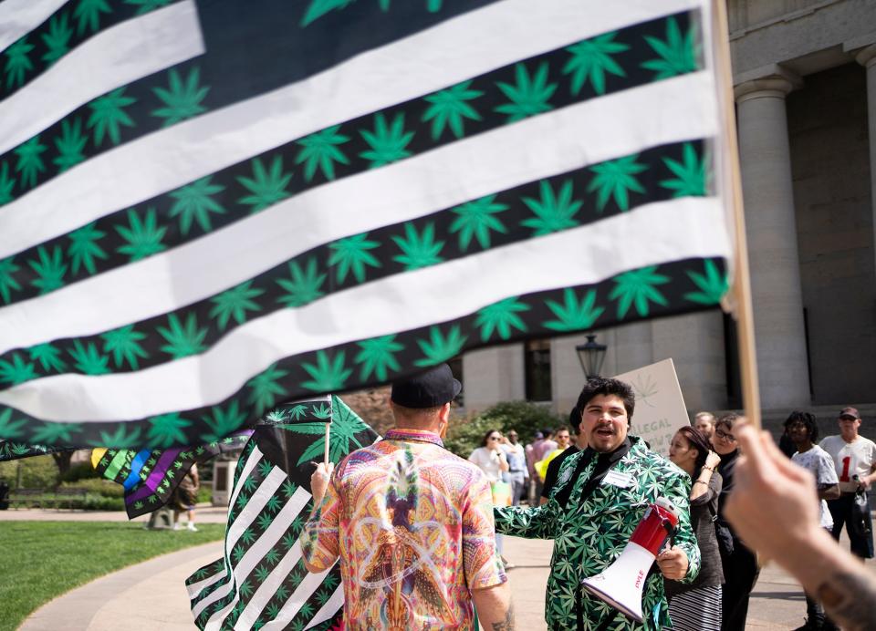 Apr 20, 2023;Columbus, Ohio, USA;  Juan Collado D’az of Sensible Movement Coalition, leads other marijuana supporters during the "People's Cannabis Lobby Day Rally" at the Ohio Statehouse.