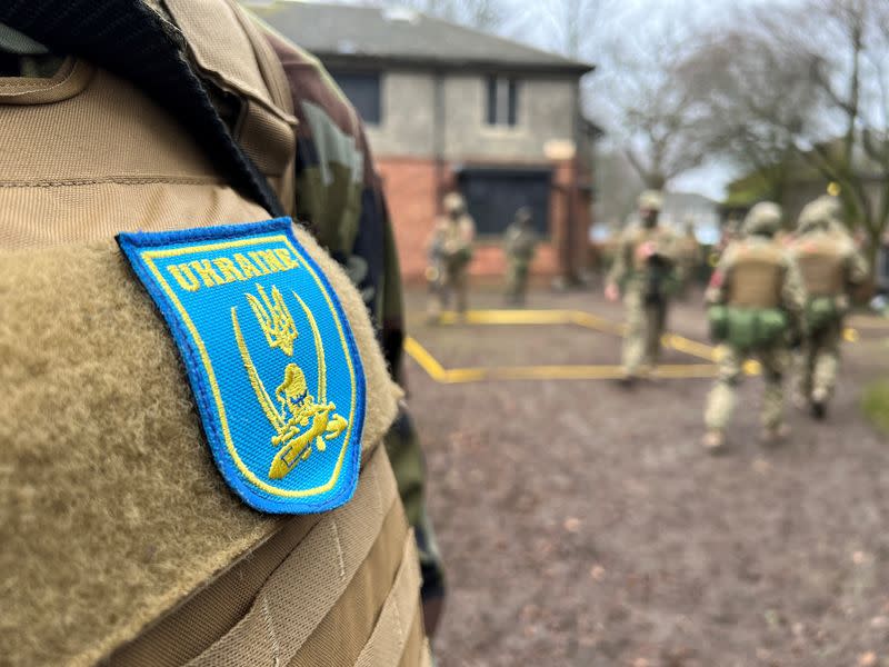 Ukrainian civilians receive urban warfare training at a military installation in the north of England