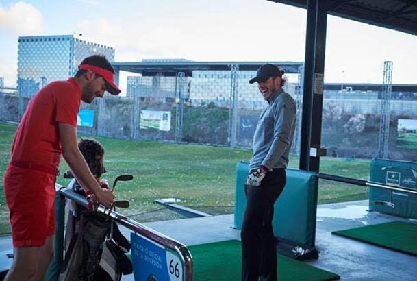 ack works on his golf swing with Real Madrid superstar Gareth Bale