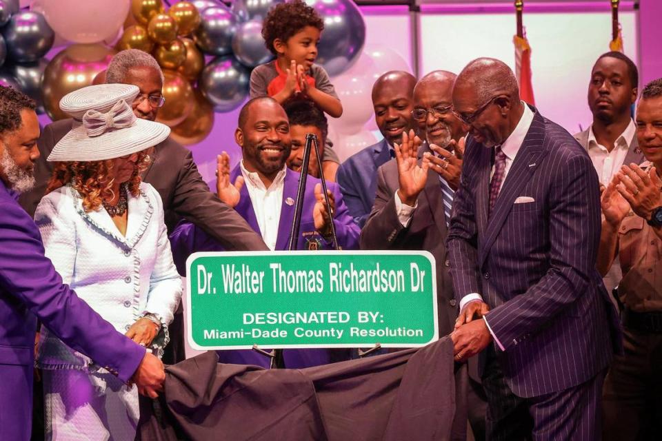 M. Dolores Richardson, left, assists her husband Dr. Walter Thomas Richardson, right, with the unveiling the street sign that bears his name. On Sunday, June 4, 2023 Miami-Dade Commissioner Kionne L. McGhee hosted a street naming ceremony to honor community leader Dr. Walter Thomas Richardson at Sweet Home Missionary Baptist Church, 10701 SW 184th St., Miami, FL 33157.