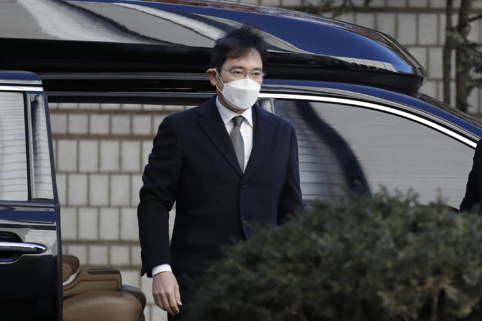 Samsung Electronics Vice Chairman Lee Jae-yong arrives at the Seoul High Court in Seoul, South Korea, Wednesday, Dec. 30, 2020. South Korean prosecutors on Wednesday requested a nine-year prison term for Samsung’s de facto chief, Lee, during a retrial of his bribery charges. The case is a key element in an explosive 2016 scandal that triggered months of public protests and toppled the country’s president. (AP Photo/Lee Jin-man)