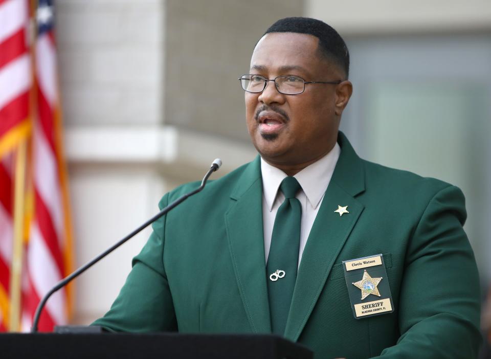 The recently elected Alachua County Sheriff Clovis Watson makes comments after he took the oath of office for the Sheriff's position during a swearing in ceremony for some of Alachua County's recently elected officials, outside the County Courthouse in Gainesville Fla., Jan. 5, 2021.