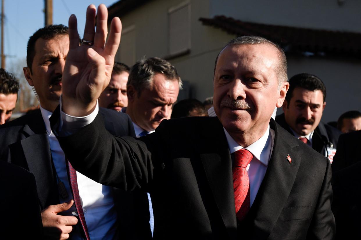 Turkish President Tayyip Erdogan waves as he exits a mosque following Friday prayers in the city of Komotini, Greece on 8 December 2017: REUTERS