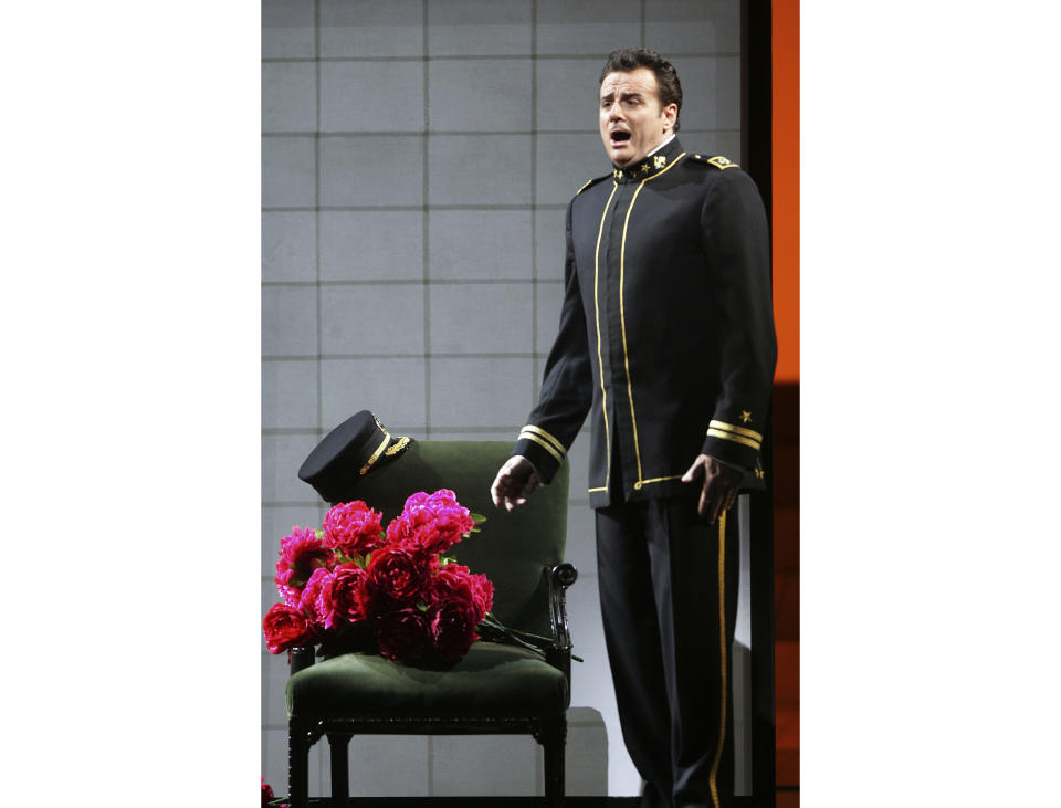 FILE - In this Sept. 22, 2006, file photo, Marcello Giordani performs as Lt. B. F. Pinkerton in the final dress rehearsal of Giacomo Puccini's "Madama Butterfly" or "Madame Butterfly" at the Metropolitan Opera, in New York. Tenor Marcello Giordani, renowned for a voice of beauty and heft that made him a star at the world's top opera houses, died Saturday, Oct. 5, 2019. He was 56. (AP Photo/Mary Altaffer, File)