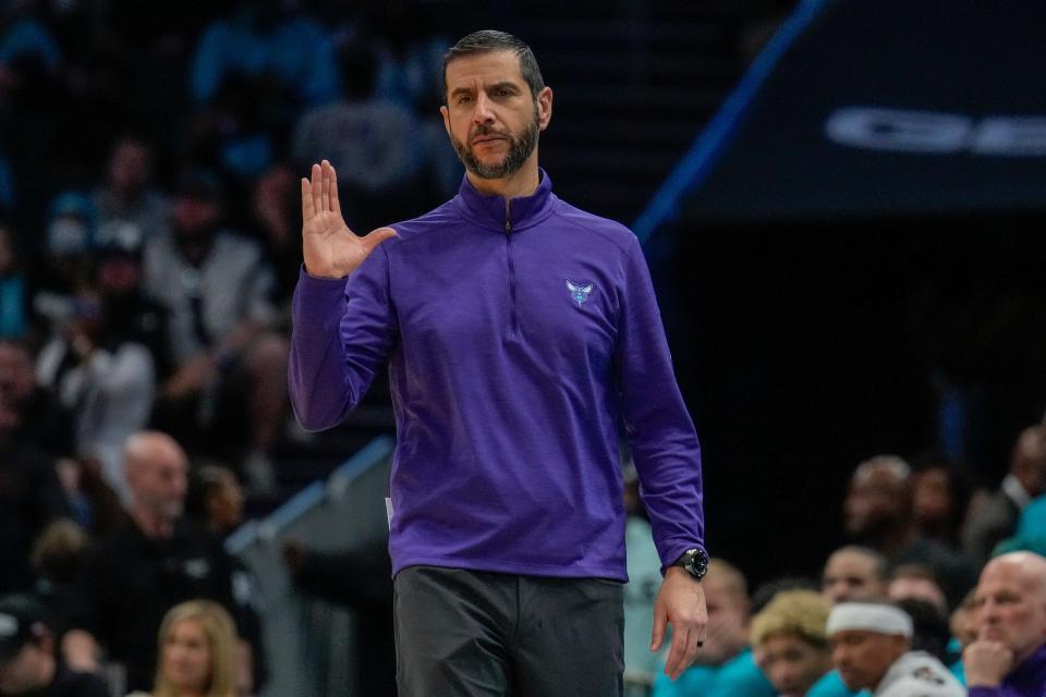 Charlotte Hornets head coach James Borrego tries to calm down his team from the sideline during the second half against the Washington Wizards at Spectrum Center.