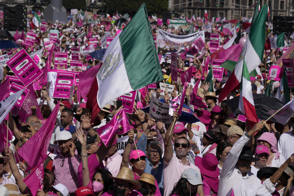 Anti-government demonstrators protest against recent reforms pushed by President Andres Manuel Lopez Obrador to the country's electoral law that they say threaten democracy, in Mexico City's main square, The Zocalo, Sunday, Feb. 26, 2023. (AP Photo/Fernando Llano)