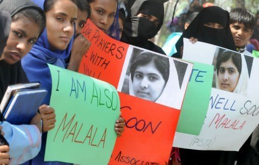 Pakistani students in Lahore protest against the assassination attempt on Malala Yousafzai. The 14-year-old Pakistani girl shot in the head by the Taliban is making progress in a British hospital, doctors said