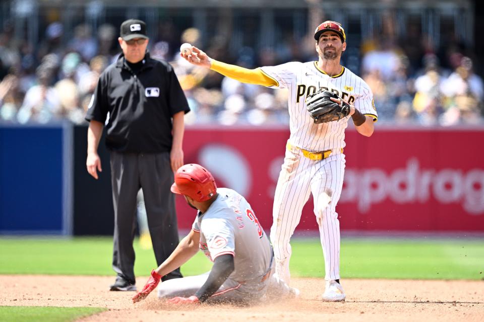 Jeimer Candelario, here being forced out at second base Wednesday, appeared to break out of his season-long slump by going  5-for-11 (.455) in the San Diego series.