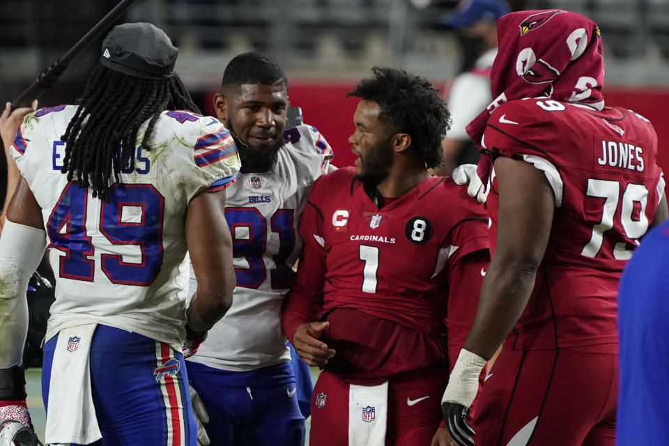 Arizona Cardinals quarterback Kyler Murray (1) and Buffalo Bills defensive tackle Ed Oliver meet at mid field an NFL football game, Sunday, Nov. 15, 2020, in Glendale, Ariz. The Cardinals won 32-20. (AP Photo/Rick Scuteri)