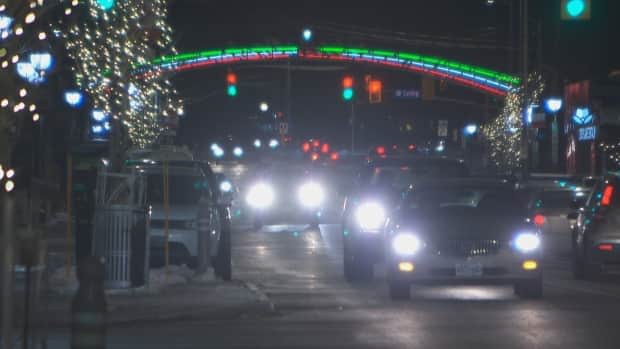 A file photo of traffic on Preston Street in Ottawa's Little Italy district at night. An ambitious vision to develop this area over the next couple of decades is one step closer to reality. (CBC - image credit)