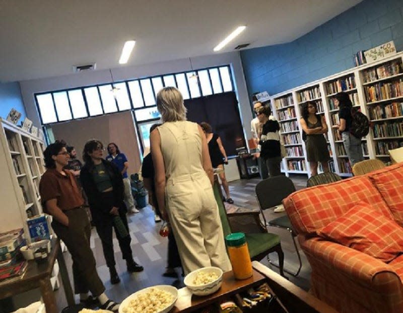 Fans of local music and poetry attend an event at lowercase books in Parkridge. Spring, 2022