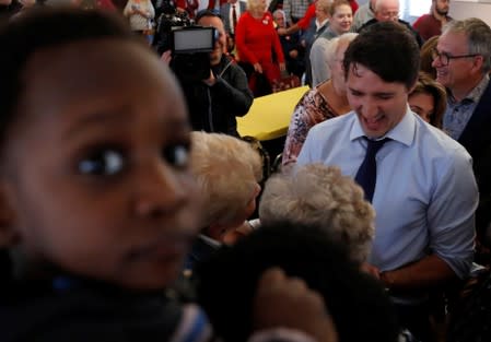 Liberal leader and Canadian Prime Minister Justin Trudeau visits a Royal Canadian Legion as he campaigns for the upcoming election, in Greenfield Park